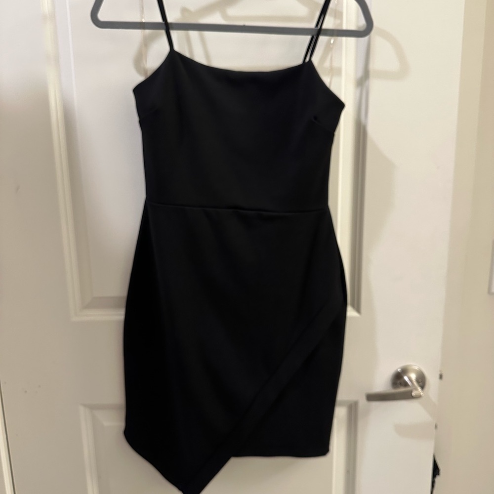 Little black dress with asymmetrical bottom
